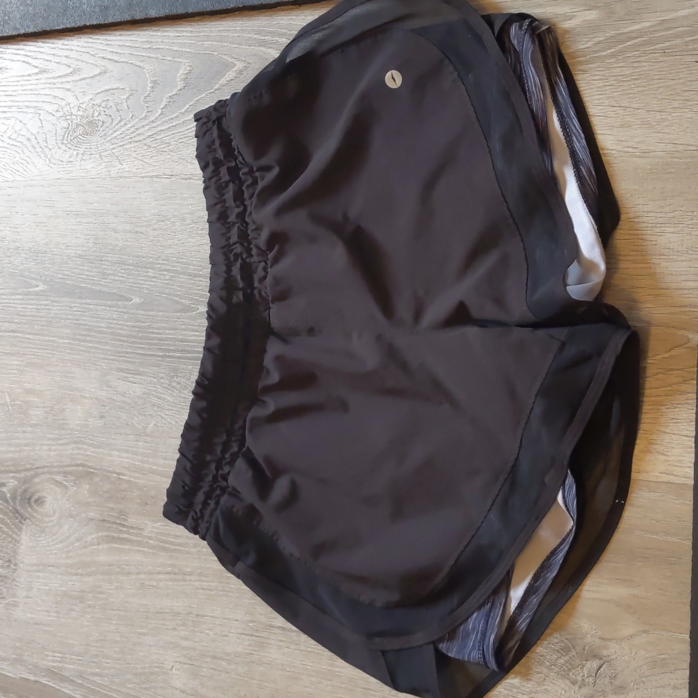 Black athletic shorts with spandex size 4-6
